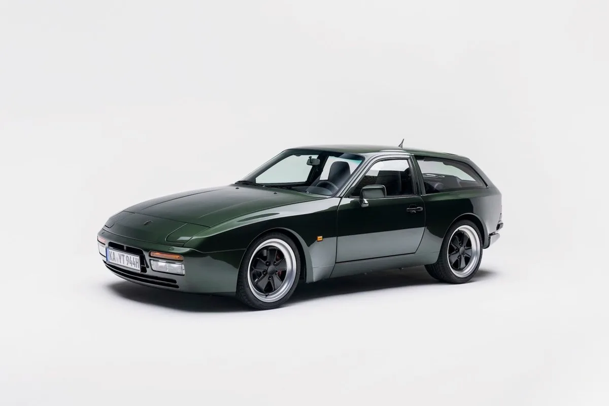 Oak Green CarPoint GT-K44 shooting brake based on a Porsche 944, front three-quarter view on a white studio background