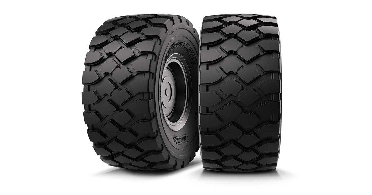 Two Double Coin REM2 off-the-road radial tires, sidewall and tread views, on a white background