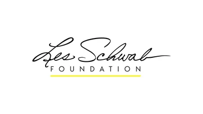Les Schwab Foundation logo: Les Schwab in black cursive script above the word FOUNDATION in spaced capital letters, with a yellow line underneath, on a white background.