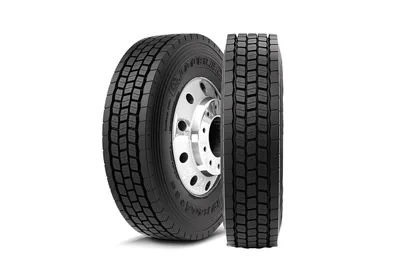 Two Double Coin RLB406 drive tires shown side by side, one angled to show the sidewall and wheel, the other facing forward to show the tread pattern.