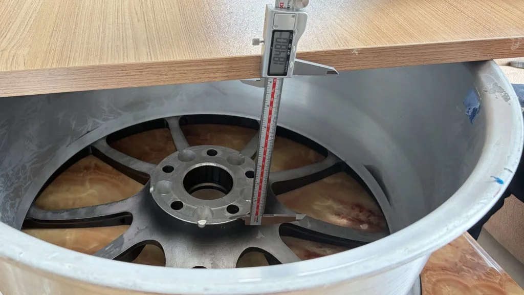 Backspacing check on a wheel with a straightedge